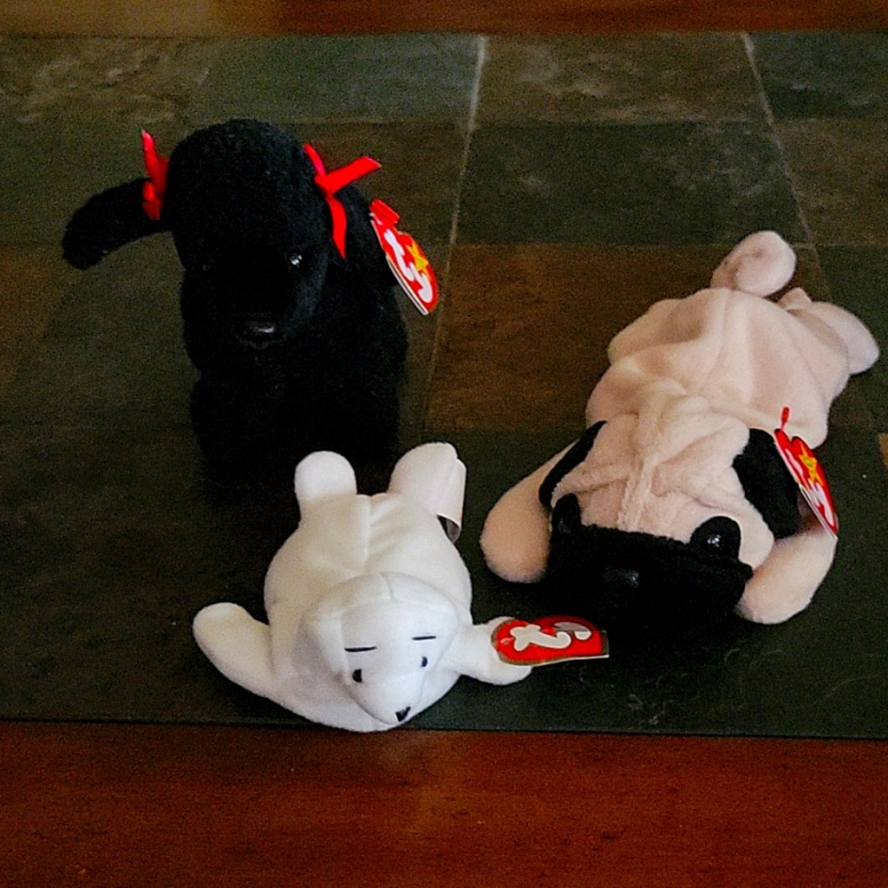 Three super cute beanie babies with original tags.